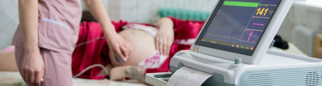 Midwife monitoring pregnant women