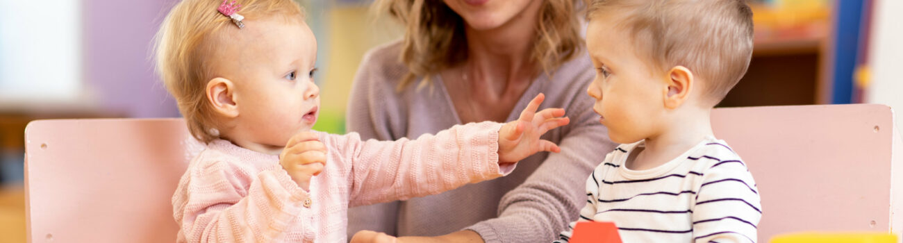 Practitioner observing children.